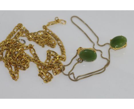 Green stone clip earrings with a silver box chain and other gilt metal chains