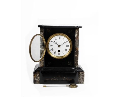 A French black slate mantle clock with marble accents, white enamel face with roman numeral markers. 