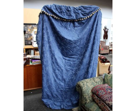 Three pairs of regency style curtains on a blue ground. 227cm by 196cm