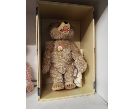 A boxed 1995 Steiff blonde 35 'Teddy Bear with Teeth', reproduced from the 1929 example limited edition 01256/3000 complete w