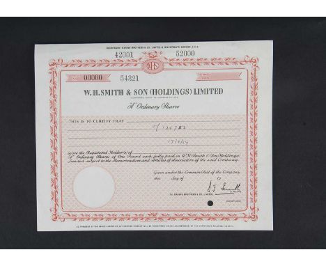 W H Smith & Son Ltd Specimen share certificate, likely produced by Bradbury Wilkiinson & Co, red and black print and measurin