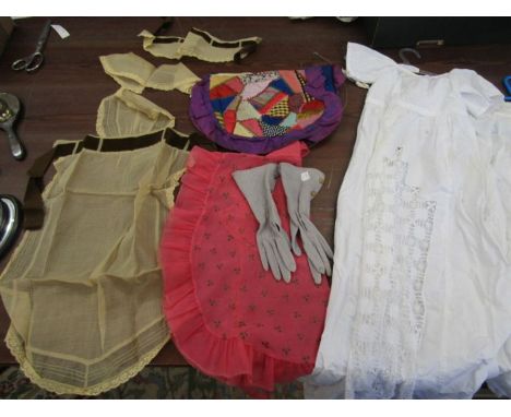 Vintage christening gowns, pre war maids outfit, vintage apron and a pair of gloves