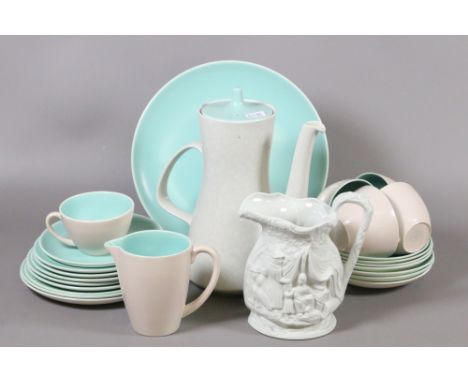 A Poole hand decorated twenty four piece coffee service along with a Portmerion moulded jug.