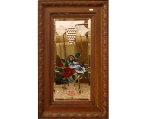 A carved oak framed gypsy mirror.