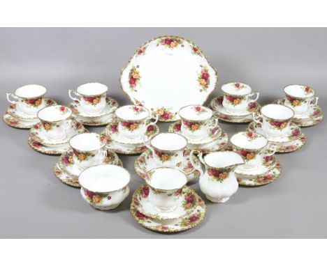 A Royal Albert Old Country Rose part tea/dinner service (approximately thirty nine pieces).
