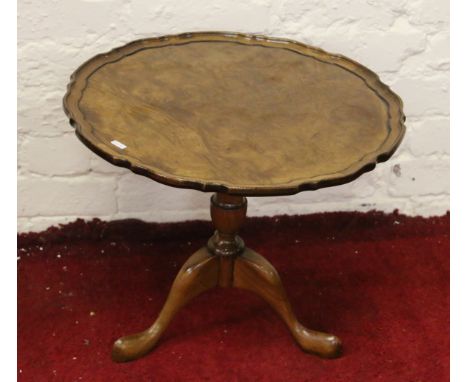 A walnut centre pedestal tripod occasional table.