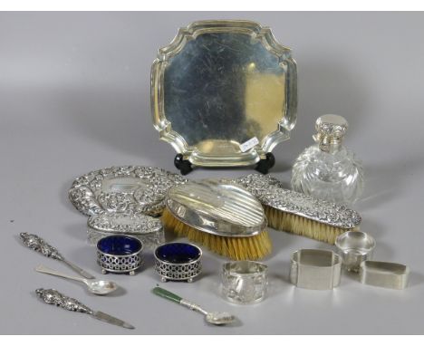 A good collection of Sterling silver, card tray assayed Birmingham, jade handled preserve spoon, napkin rings, blue glass lin