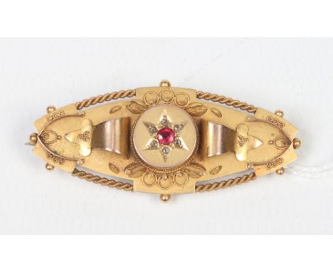 A George V 9 carat gold, diamond and ruby brooch assayed Chester 1913, 3.90 grams.