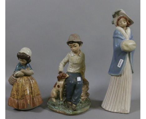 A Nao bisque figure 'Boy and Dog' along with a Nao figure of a woman and a Lladro bisque figure of a young girl.