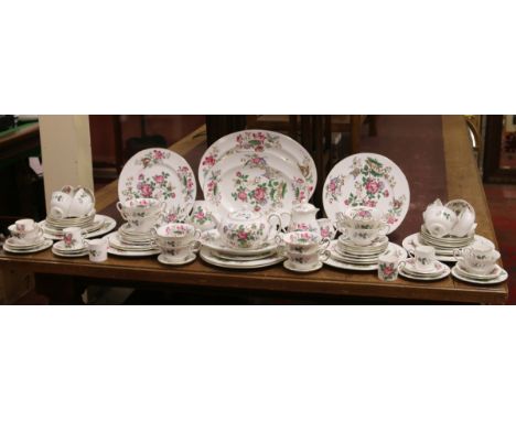 A comprehensive Wedgwood tea and dinner service decorated in the Charnwood design (eighty six pieces).