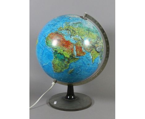 An illuminating desk globe.