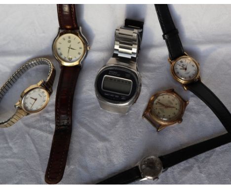 A Seiko LC digital watch together with A Gucci watch, Lorus wristwatch and other wristwatches