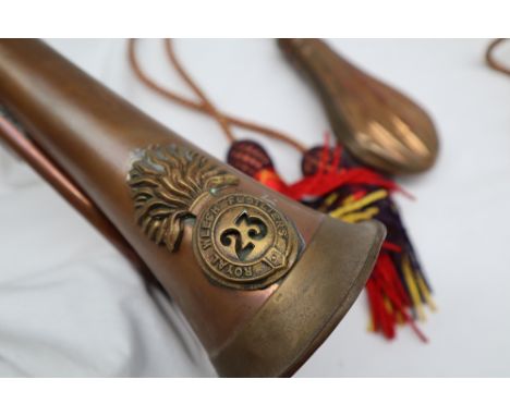 A copper shot flask with ribbed decoration J.W. Hawksley together with a Royal Welsh Fusiliers bugle