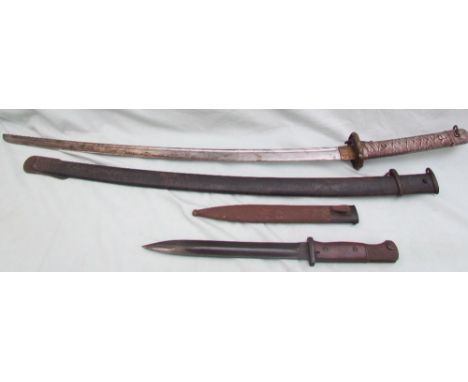 A Japanese samurai sword, the white metal grip with moulded stringing, the curved fullered blade numbered 45708, in a steel s