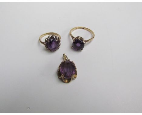 Two 9ct yellow gold amethyst set dress rings together with a yellow metal mounted amethyst pendant