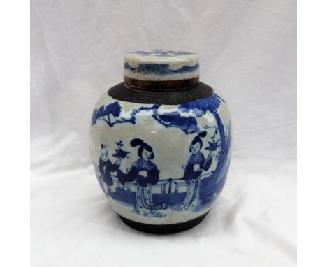 A Chinese porcelain blue and white crackle glaze ginger jar and cover, the domed lid above a bulbous body, decorated with chi