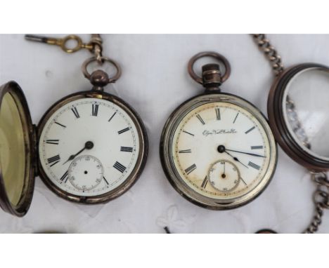 A late Victorian silver open faced pocket watch with an enamel dial, seconds subsidiary dial and Roman numerals, the back pla