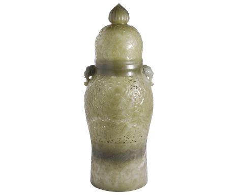 A CHINESE MUGHAL STYLE CELADON JADE 'DRAGON' VASE AND COVER the baluster body set at the shoulder with a pair of elephant han