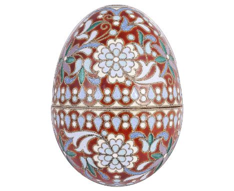 A RUSSIAN STYLE CLOISONNE ENAMEL AND SILVER-GILT EGG, 20TH CENTURY in two parts, foliate motifs and pellets in green, white a