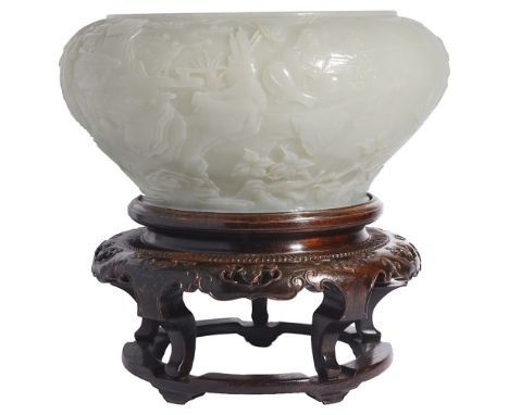 A CHINESE PALE CELADON JADE 'SCHOLARS' BOWL the baluster body rising from a flat base to an inverted rim, carved around the e