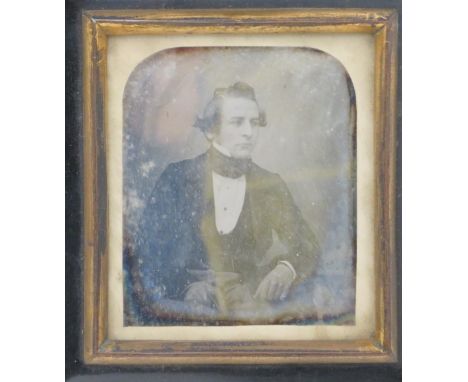 ˜A DAGUERROTYPE OF A YOUNG GENTLEMAN, CIRCA 1845 in rectangular ebonised frame, image 7.5cm high; together with a portrait mi