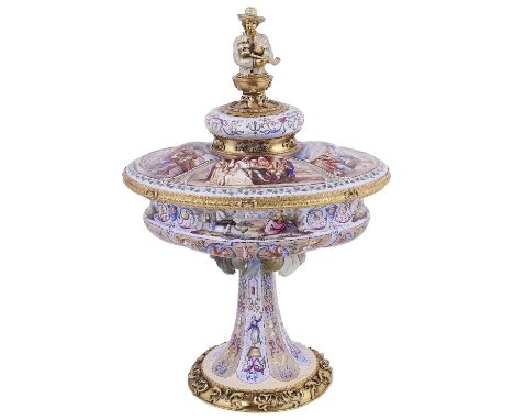 AN AUSTRO-HUNGARIAN SILVER-GILT AND ENAMEL CUP AND COVER, KARL RÖSSLER, VIENNA, CIRCA 1900 the finial cast as a half-length f