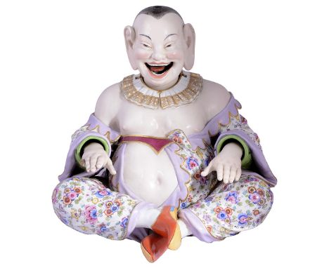 A LARGE MEISSEN NODDING 'PAGODA' FIGURE, CIRCA 1860 modelled as a grinning Chinoiserie figure seated cross-legged in purple l