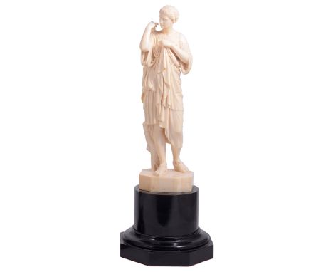 ˜A FRENCH IVORY FIGURE AFTER THE ANTIQUE, 'DIANE DE GABIES', PERHAPS DIEPPE, LATE 19TH CENTURY Diana carved holding her drape