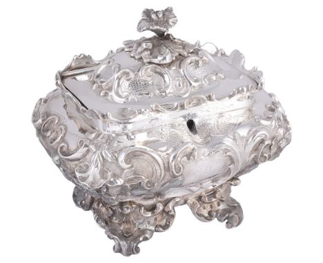 A VICTORIAN SILVER TEA CADDY, JOHN EDWARD TERREY, LONDON, 1846 of shouldered oblong form, the sides and hinged lid richly emb