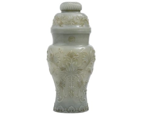 A CHINESE MUGHAL-STYLE GREYISH-CELADON JADE 'LOTUS' VASE AND COVER the flattened baluster body rising from a recessed base to