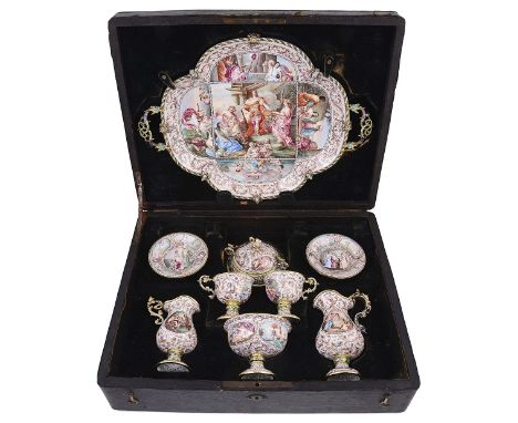 AN AUSTRO-HUNGARIAN SILVER-GILT AND ENAMEL CABARET SET, HERMANN BÖHM, VIENNA, LATE 19TH CENTURY painted with a variety of myt