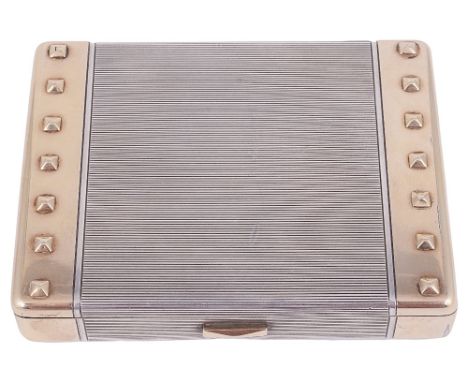 A FRENCH SILVER AND GOLD CIGARETTE CASE, CARTIER, PARIS, 1930s oblong, with linear engine-turned silver between gold bands ea