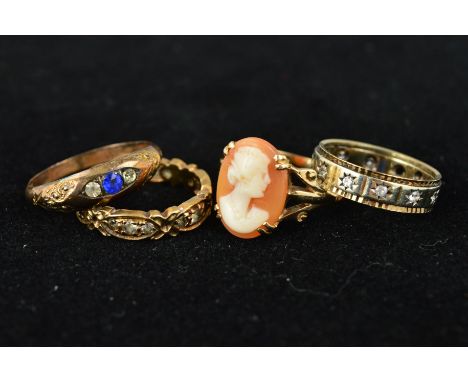 A SELECTION OF DRESS RINGS to include two synthetic spinel full eternity rings, a cameo ring and an early 20th Century paste 