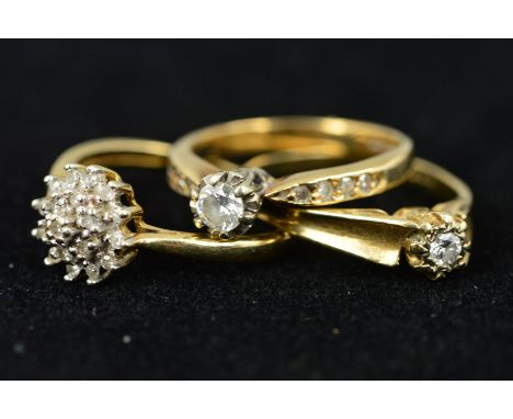 THREE 9CT GOLD DIAMOND RINGS, the first designed as brilliant cut diamond to the single cut diamond shoulders, estimated prin