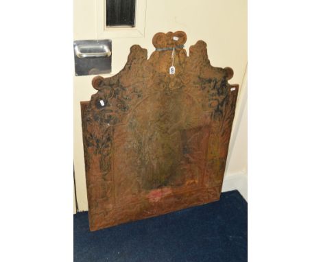 A VICTORIAN CAST IRON FIRE BACK with central putti and coat of arms above, approximate size 78cm x 101cm