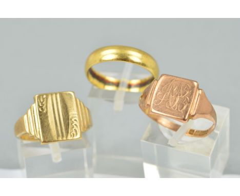 TWO 9CT GOLD RINGS AND AN 18CT GOLD RING, the first of square signet ring design with engraved scrolling monogram, ring size 