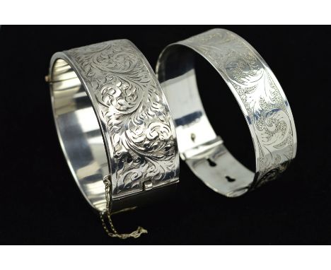 TWO SILVER BANGLES, the first a Charles Horner buckle style design bangle, engraved with scrolling acanthus decoration, hallm