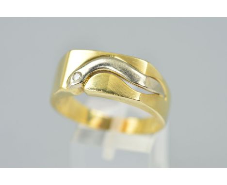 A GENTLEMAN'S DIAMOND SET YELLOW METAL RING, of a signet ring design with a pierced snake like panel across the centre in whi
