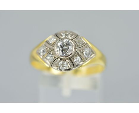 AN EARLY 20TH CENTURY DIAMOND DRESS RING, bombe shape, centring on a principle old cut diamond, estimated approximately 0.50c