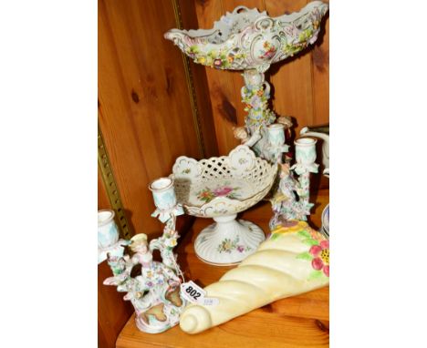 A LATE 19TH CENTURY CONTINENTAL PORCELAIN FIGURAL COMPORT, floral encrusted decoration, restored, height 37cm together with a