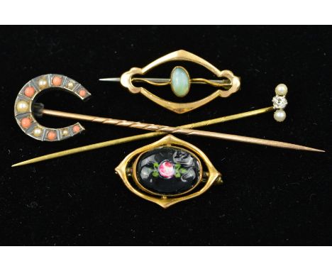TWO STICKPINS AND TWO CHARLES HORNER BROOCHES, the first stickpin designed as a slanted row set with a central diamond flanke