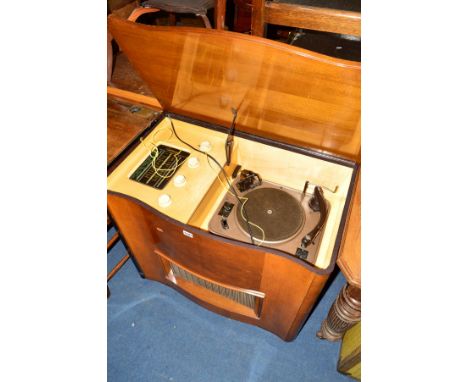 A BUSH WALNUT GRAMOPHONE with a serpentine front and Garrard turntable