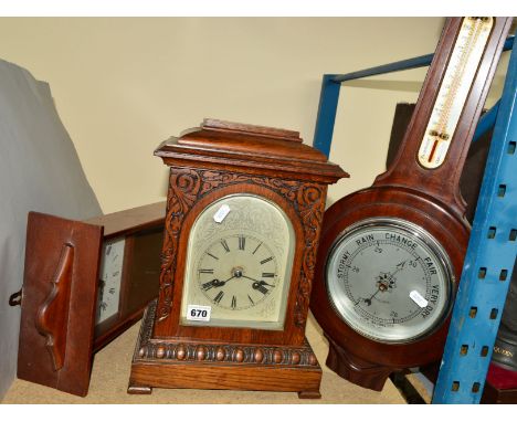 AN OAK CASED BRACKET CLOCK with a Junghans movement, approximate height 36cm (two keys and pendulum), together with a Precisi