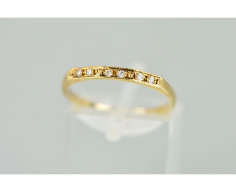A CUBIC ZIRCONIA HALF ETERNITY RING, designed as six circular cubic zirconias, stamped 585, ring size M 1/2, weight 1.4 grams