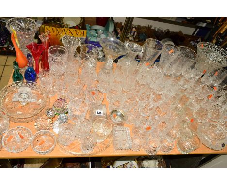 A QUANTITY OF GLASSWARE, including vases, drinking glasses, coloured glass birds, paperweights etc