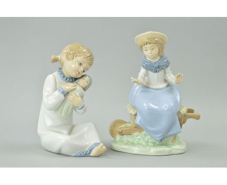 TWO NAO FIGURES, girl sitting on wheelbarrow (missing bird off hand) and young girl with dog (2)