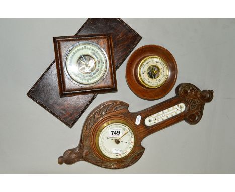 THREE WOODEN FRAMED ANEROID BAROMETERS, one inset with a mercury thermometer, approximate height 47cm