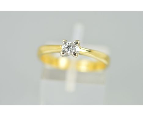 A DIAMOND SINGLE STONE RING, designed as a  brilliant cut diamond within a four claw setting to the tapered plain band, estim