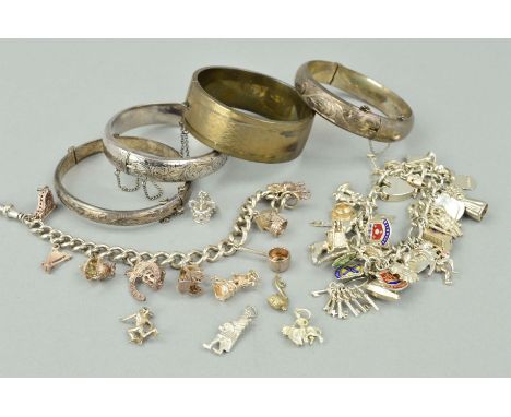 A SELECTION OF SILVER BANGLES AND A CHARM BRACELET to include a Smith &amp; Pepper oval hinged bangle with engine turning dec