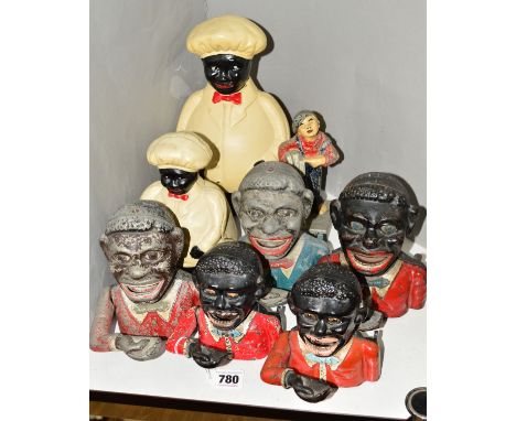 A COLLECTION OF JOLLY GENTLEMAN MONEY BOXES, three are cast iron (one missing base) and two are aluminium, all with paint los